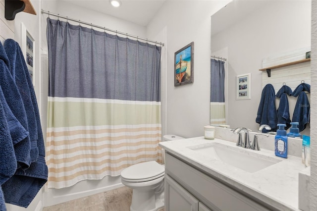 14728 Scott Key Dr, Winter Garden, FL 34787 - full bath with vanity, wood finished floors, and shower / bath combo with shower curtain