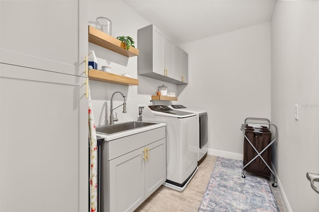 14728 Scott Key Dr, Winter Garden, FL 34787 - laundry room with cabinet space and washer and clothes dryer