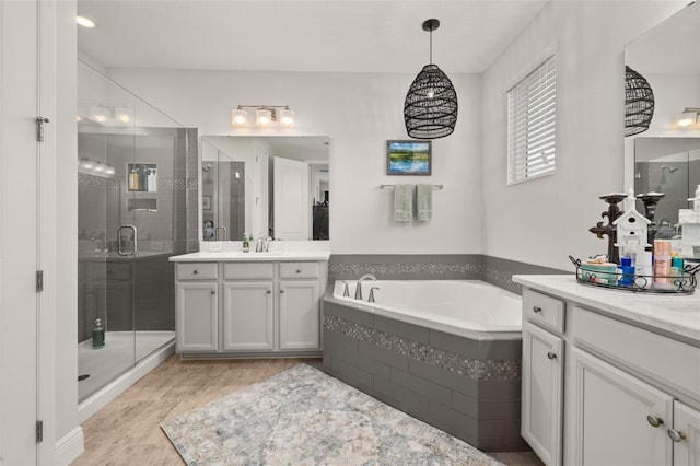 14728 Scott Key Dr, Winter Garden, FL 34787 - bathroom featuring vanity, a stall shower, and a bath
