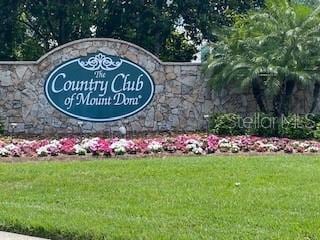 9048 Saint Andrews Way, Mount Dora, FL 32757 - community / neighborhood sign with a lawn
