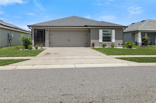 211 Foxtail Loop, Davenport, FL 33837 - ranch-style home with driveway, a front lawn, a garage, and stucco siding