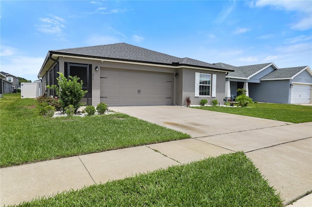211 Foxtail Loop, Davenport, FL 33837 - ranch-style house with an attached garage, a front yard, driveway, and stucco siding