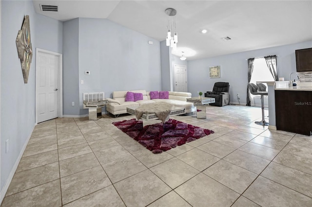 211 Foxtail Loop, Davenport, FL 33837 - living room with light tile patterned flooring and baseboards