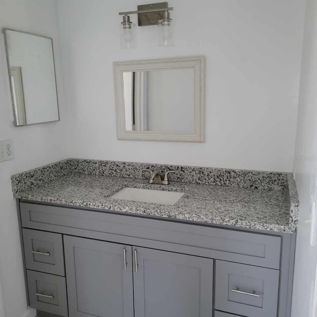 621 N Delmonte Ct, Kissimmee, FL 34758 - bathroom with vanity