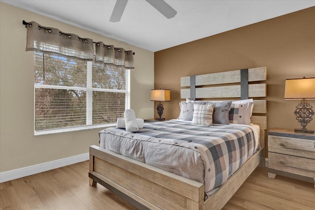 2234 Calabria Ave, Davenport, FL 33897 - bedroom featuring wood finished floors and ceiling fan