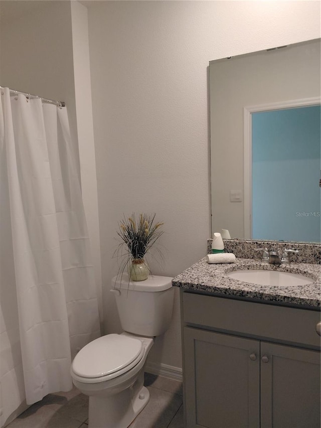 2132 Desert Rose Dr, Davenport, FL 33837 - full bath featuring vanity, tile patterned flooring, and curtained shower
