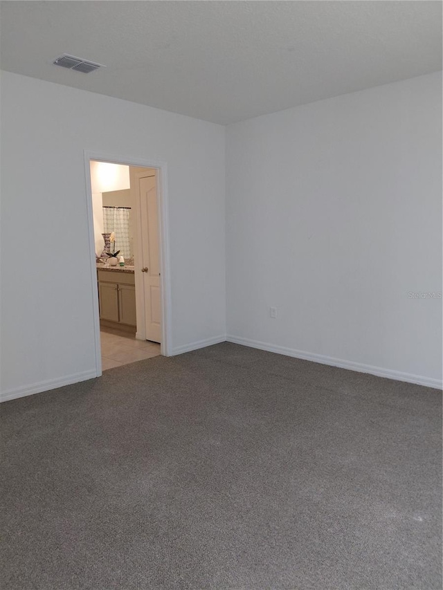 2132 Desert Rose Dr, Davenport, FL 33837 - empty room featuring light colored carpet and baseboards