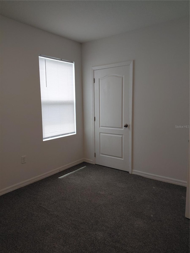 2132 Desert Rose Dr, Davenport, FL 33837 - spare room with carpet flooring and baseboards