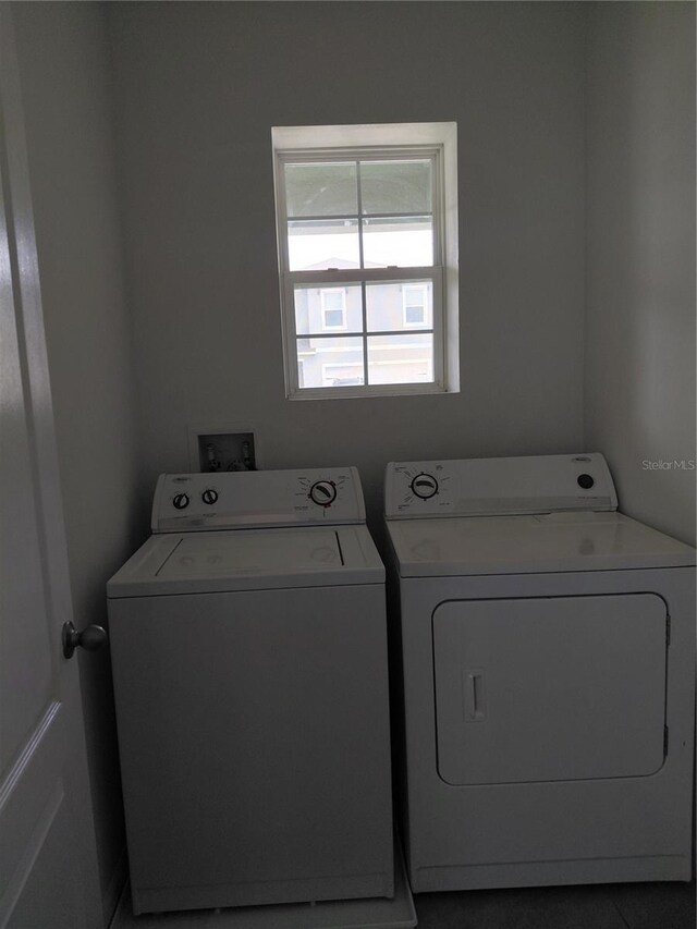 2132 Desert Rose Dr, Davenport, FL 33837 - washroom with separate washer and dryer