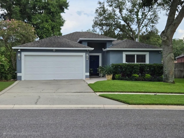 2126 Wekiva Reserve Blvd, Apopka, FL 32703 - view of front facade featuring stucco siding, an attached garage, a front lawn, driveway, and roof with shingles
