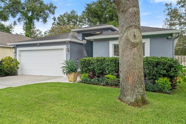 2126 Wekiva Reserve Blvd, Apopka, FL 32703 - view of front of home with stucco siding, an attached garage, a front lawn, driveway, and a shingled roof