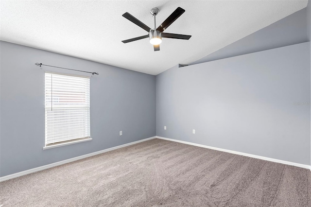 2126 Wekiva Reserve Blvd, Apopka, FL 32703 - empty room featuring a ceiling fan, vaulted ceiling, carpet, and a textured ceiling