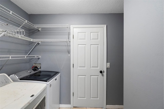 2126 Wekiva Reserve Blvd, Apopka, FL 32703 - washroom with washing machine and dryer and baseboards