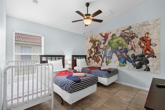 242 Saragossa Ave, Davenport, FL 33897 - bedroom with vaulted ceiling, tile patterned flooring, and ceiling fan