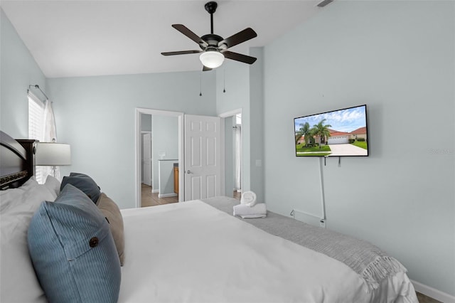 242 Saragossa Ave, Davenport, FL 33897 - bedroom featuring vaulted ceiling and a ceiling fan