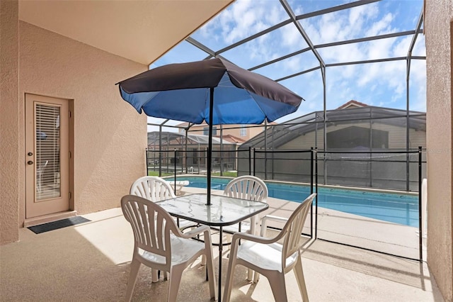 242 Saragossa Ave, Davenport, FL 33897 - outdoor pool featuring a patio, a lanai, and outdoor dining space