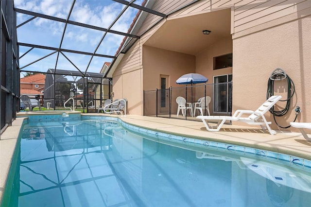 242 Saragossa Ave, Davenport, FL 33897 - view of swimming pool with a patio, a lanai, and a pool with connected hot tub