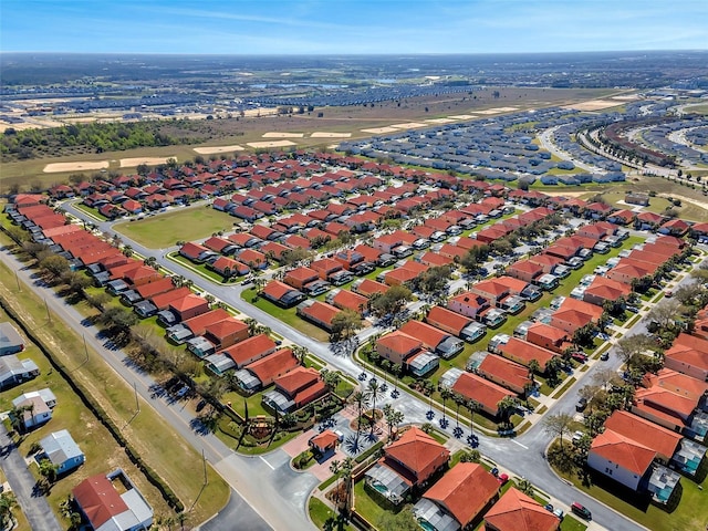 242 Saragossa Ave, Davenport, FL 33897 - aerial view of property's location featuring nearby suburban area