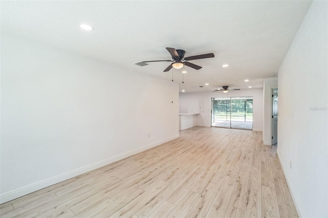 4212 Harry Dr, Fruitland Park, FL 34731 - spare room with light wood finished floors, ceiling fan, and recessed lighting