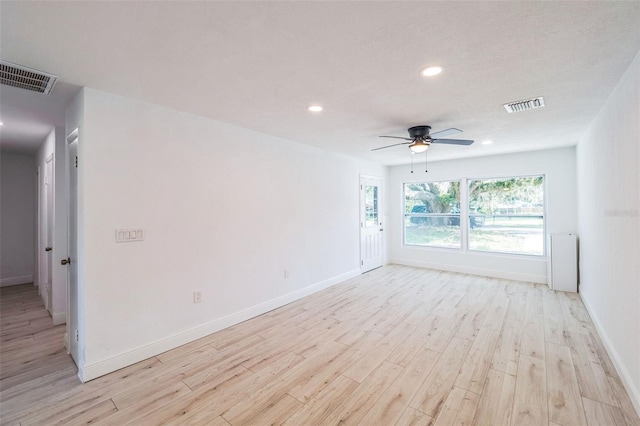 4212 Harry Dr, Fruitland Park, FL 34731 - spare room with light wood-style flooring, a ceiling fan, and recessed lighting