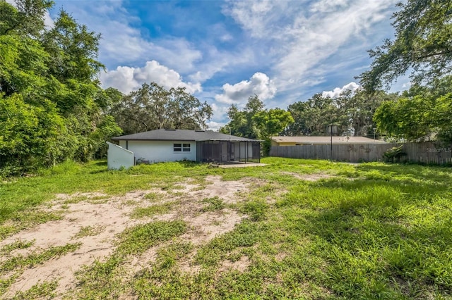 4212 Harry Dr, Fruitland Park, FL 34731 - view of yard featuring a sunroom