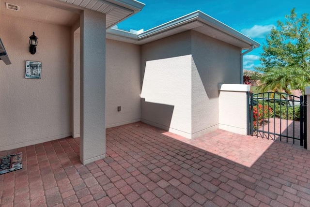3432 Fallbrook Dr, Poinciana, FL 34759 - view of patio / terrace with a gate