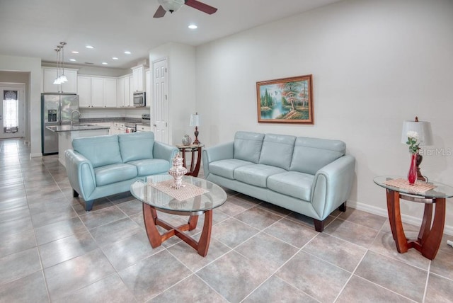 3432 Fallbrook Dr, Poinciana, FL 34759 - living room with ceiling fan, recessed lighting, and light tile patterned floors