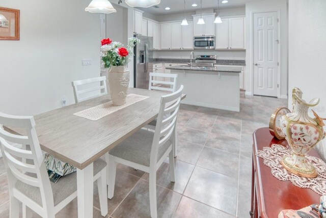 3432 Fallbrook Dr, Poinciana, FL 34759 - dining room featuring recessed lighting and light tile patterned flooring