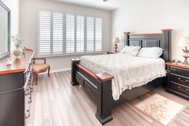 3432 Fallbrook Dr, Poinciana, FL 34759 - bedroom with light wood-style flooring and baseboards