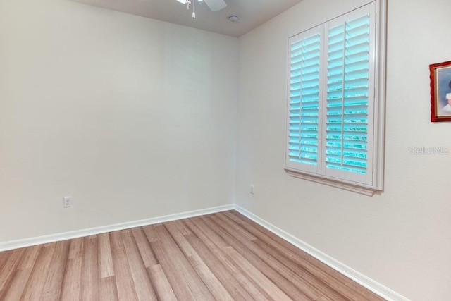 3432 Fallbrook Dr, Poinciana, FL 34759 - spare room with light wood-type flooring, ceiling fan, and a smoke detector