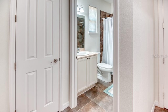 3432 Fallbrook Dr, Poinciana, FL 34759 - bathroom featuring vanity, a shower with curtain, and tile patterned flooring