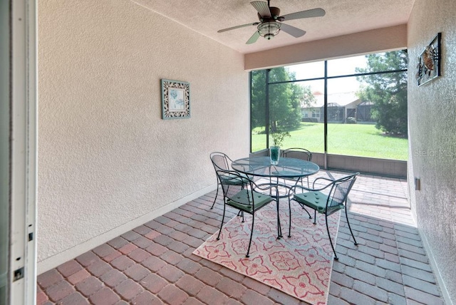 3432 Fallbrook Dr, Poinciana, FL 34759 - sunroom with ceiling fan and outdoor dining space