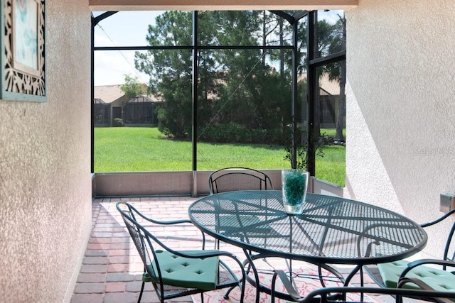 3432 Fallbrook Dr, Poinciana, FL 34759 - sunroom / solarium featuring plenty of natural light and outdoor dining space