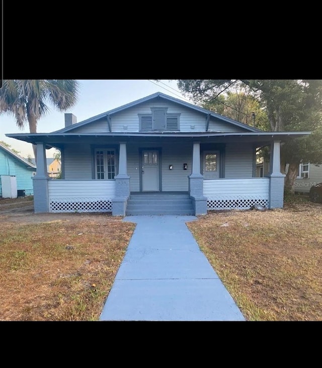 838 E Lime St, Lakeland, FL 33801 - bungalow-style home featuring covered porch
