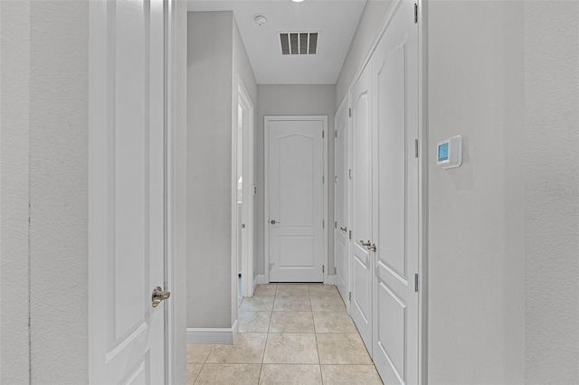 2419 Datura Loop, Saint Cloud, FL 34772 - hall with light tile patterned flooring and baseboards