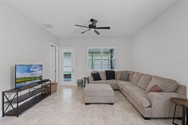 2419 Datura Loop, Saint Cloud, FL 34772 - living area with a ceiling fan and light tile patterned floors