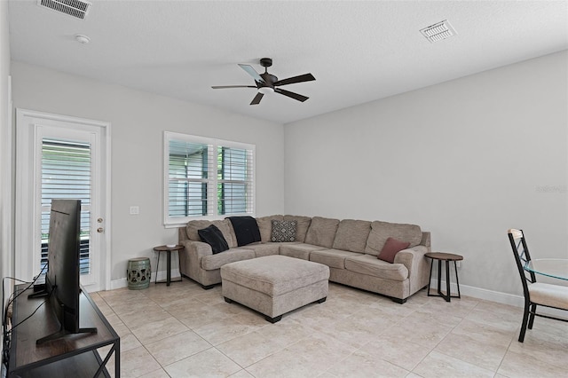 2419 Datura Loop, Saint Cloud, FL 34772 - living room with ceiling fan and light tile patterned floors