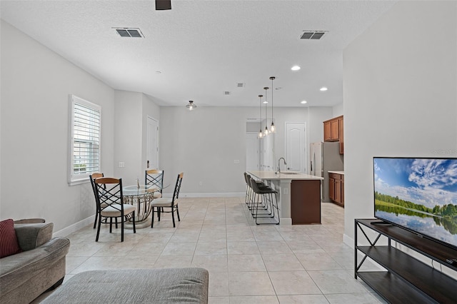 2419 Datura Loop, Saint Cloud, FL 34772 - dining area featuring light tile patterned floors and recessed lighting