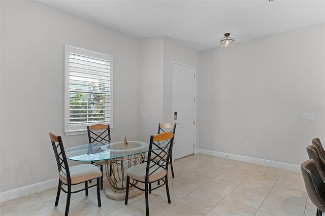 2419 Datura Loop, Saint Cloud, FL 34772 - dining area featuring light tile patterned flooring and baseboards