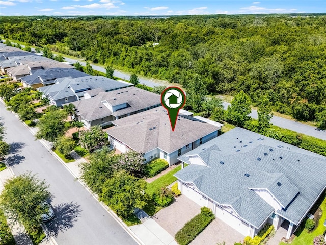 2419 Datura Loop, Saint Cloud, FL 34772 - aerial perspective of suburban area featuring a heavily wooded area