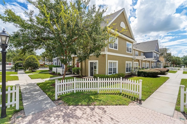 2602 Lodi Cir Unit 107, Kissimmee, FL 34746 - view of front of property featuring stucco siding