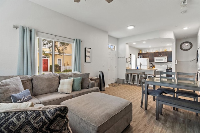 2602 Lodi Cir Unit 107, Kissimmee, FL 34746 - living room with light wood-type flooring, recessed lighting, and ceiling fan