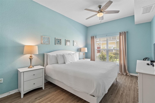 2602 Lodi Cir Unit 107, Kissimmee, FL 34746 - bedroom with wood finished floors and ceiling fan
