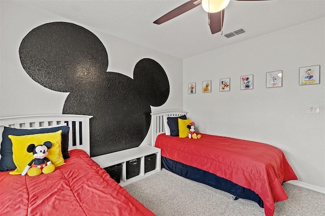 2602 Lodi Cir Unit 107, Kissimmee, FL 34746 - carpeted bedroom with a ceiling fan