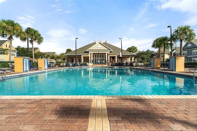 2602 Lodi Cir Unit 107, Kissimmee, FL 34746 - community pool featuring a patio area
