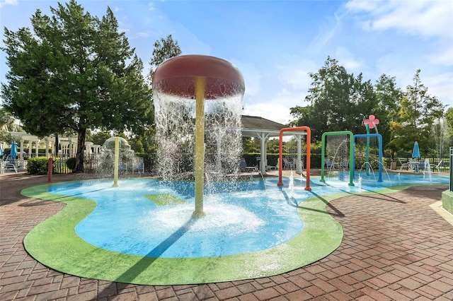 2602 Lodi Cir Unit 107, Kissimmee, FL 34746 - view of pool featuring a water play area and a swimming pool