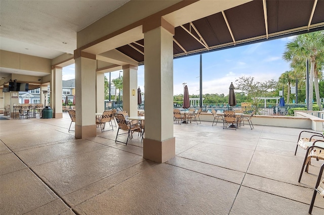 2602 Lodi Cir Unit 107, Kissimmee, FL 34746 - view of patio featuring outdoor dining space