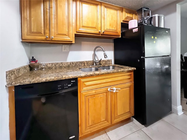 4755 S Texas Ave Unit 4755D, Orlando, FL 32839 - kitchen featuring black appliances, light tile patterned flooring, stone countertops, and brown cabinets
