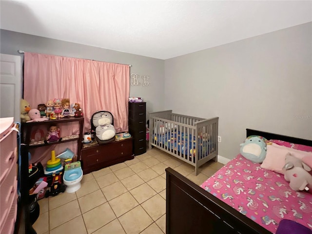 4755 S Texas Ave Unit 4755D, Orlando, FL 32839 - bedroom with light tile patterned floors