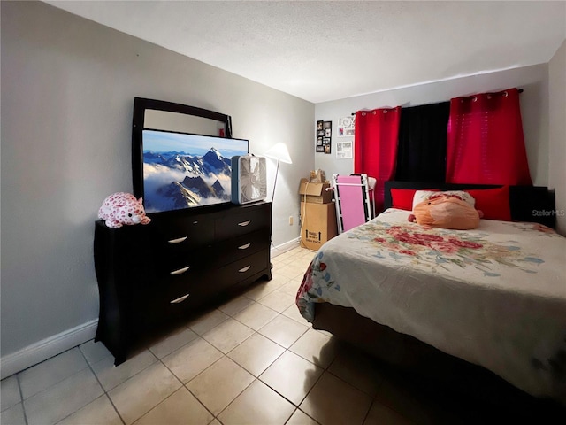 4755 S Texas Ave Unit 4755D, Orlando, FL 32839 - bedroom featuring light tile patterned flooring and baseboards